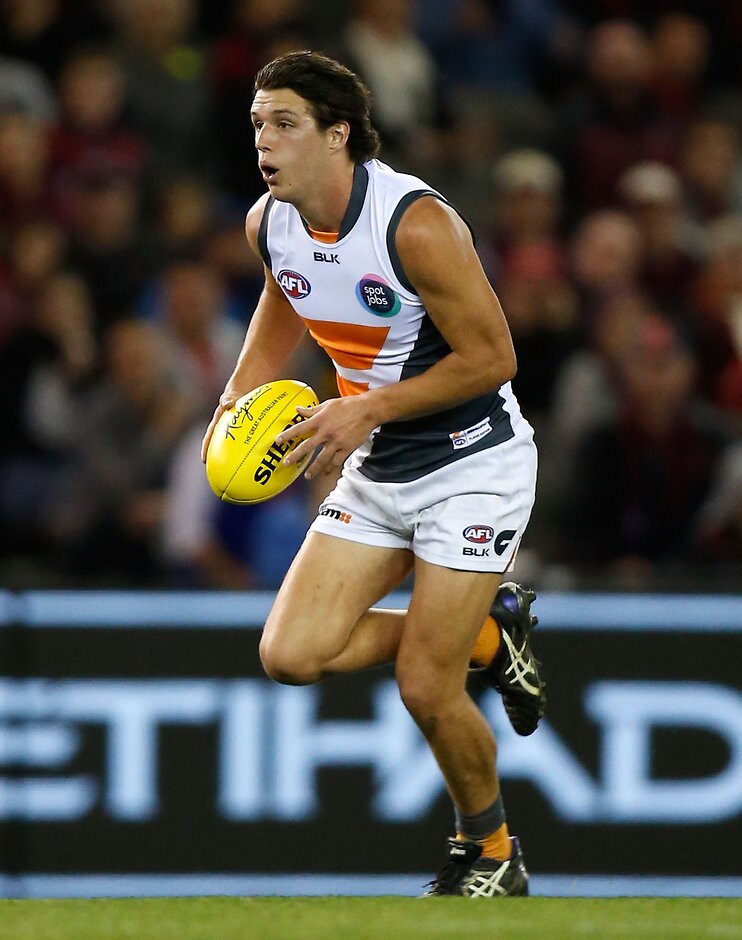 AFL 2015 Rd 23 - Melbourne v GWS Giants MELBOURNE, AUSTRALIA - SEPTEMBER 6: Debutant, Jake Barrett of the Giants in action during the 2015 AFL round 23 match between the Melbourne Demons and the GWS Giants at Etihad Stadium, Melbourne, Australia on September 6, 2015. (Photo by Michael Willson/AFL Media)